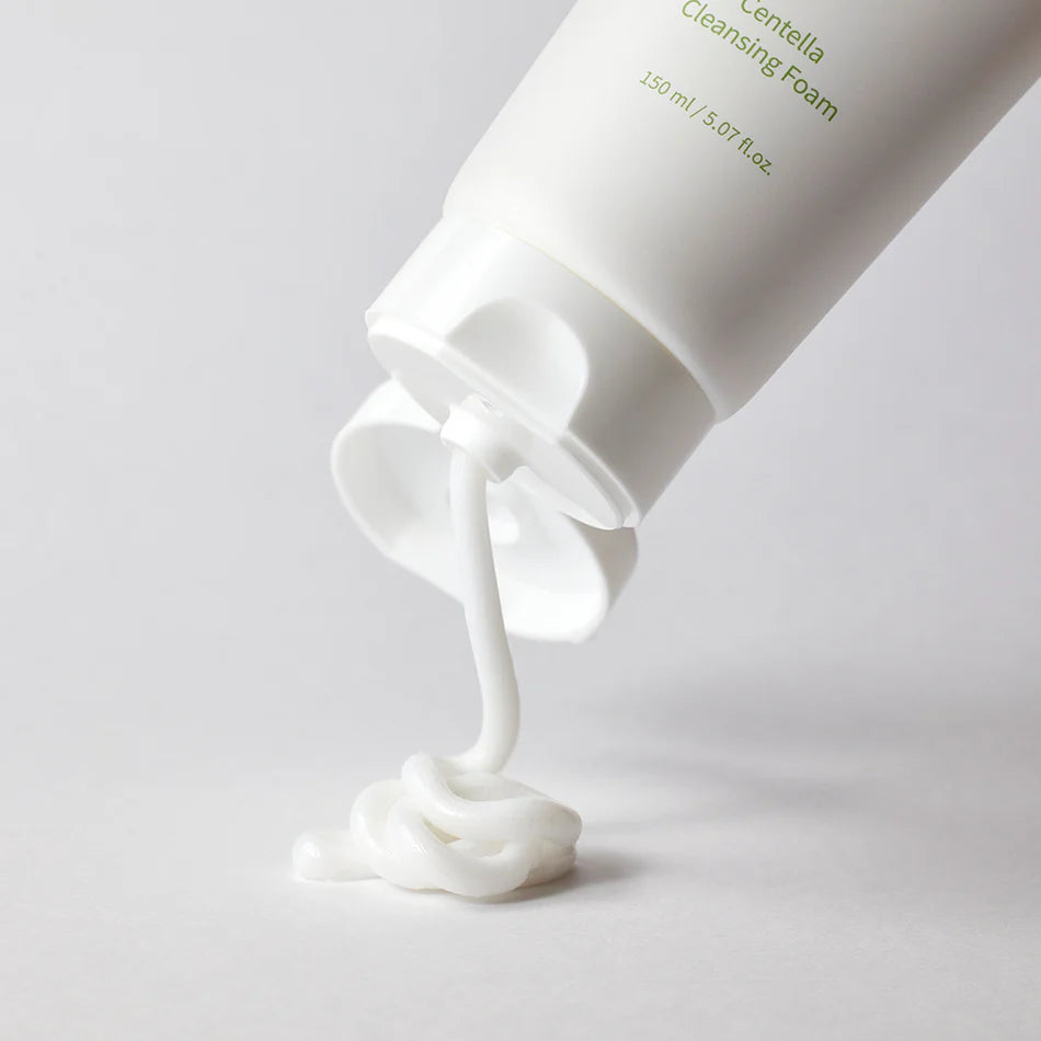 Centella Cleansing Foam 150ml pouring out on white background