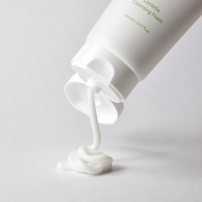 Centella Cleansing Foam 150ml pouring out on white background