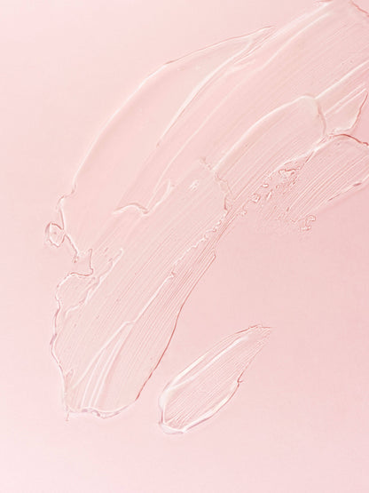Close-up of pink textured skin1004 madagascar centel apremizing light gel cream on a light pink background