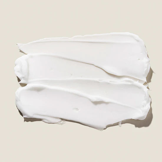 Mary & May - Tranexamic Acid + Glutathione Eye Cream 30ml  White cream or lotion swatch on a beige background